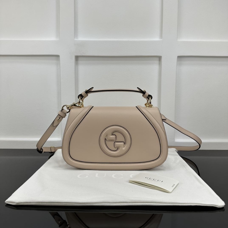 G*u*i top handle bags